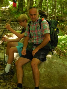 Our sherpas (Dwight & Isaac) looking a little tired after toting our packs up the first mile or so. :-)