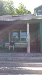 Resting on the front porch of one of the huts...